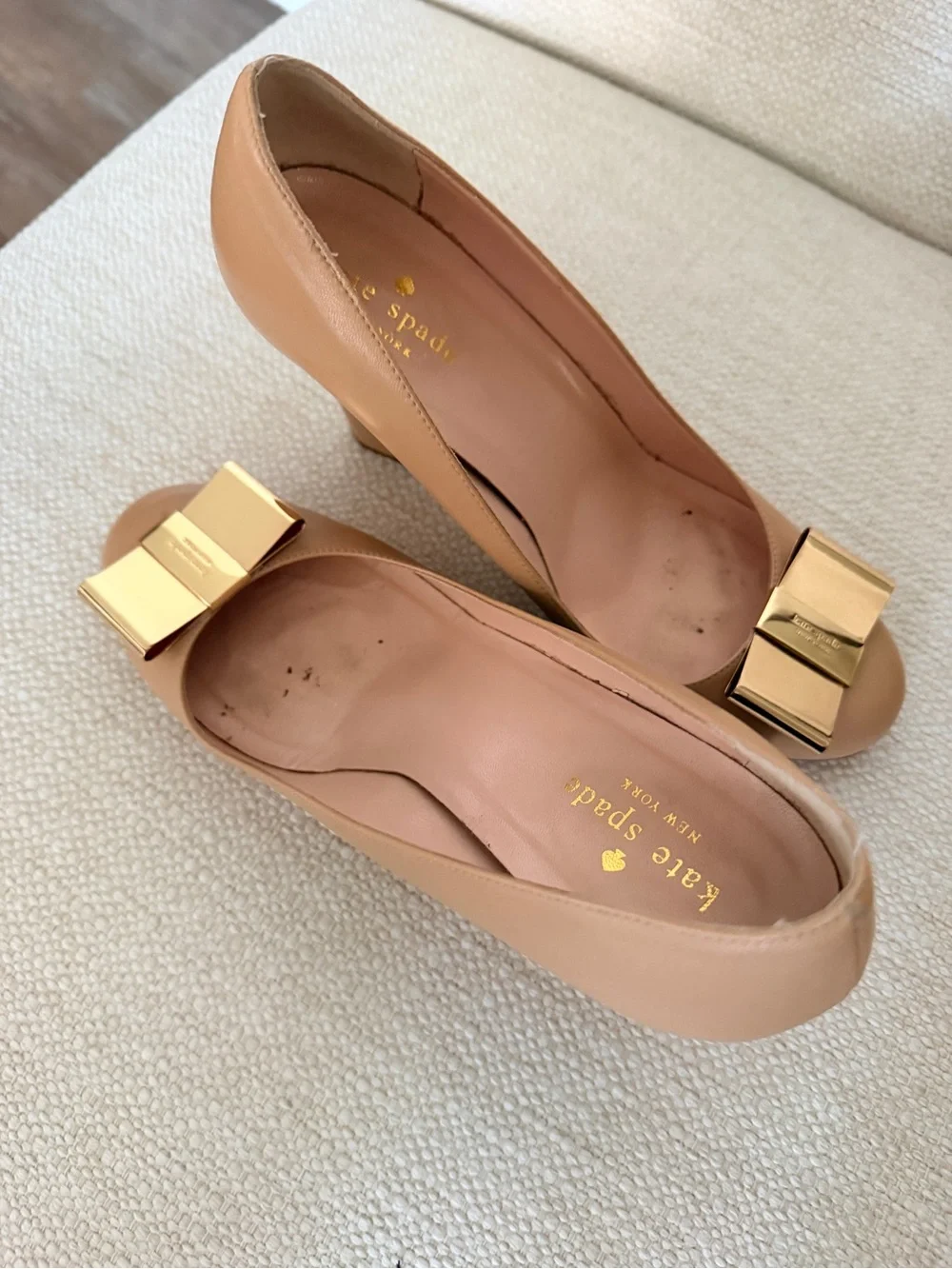 kate spade tan nude peep-toe pumps with gold bow hardware